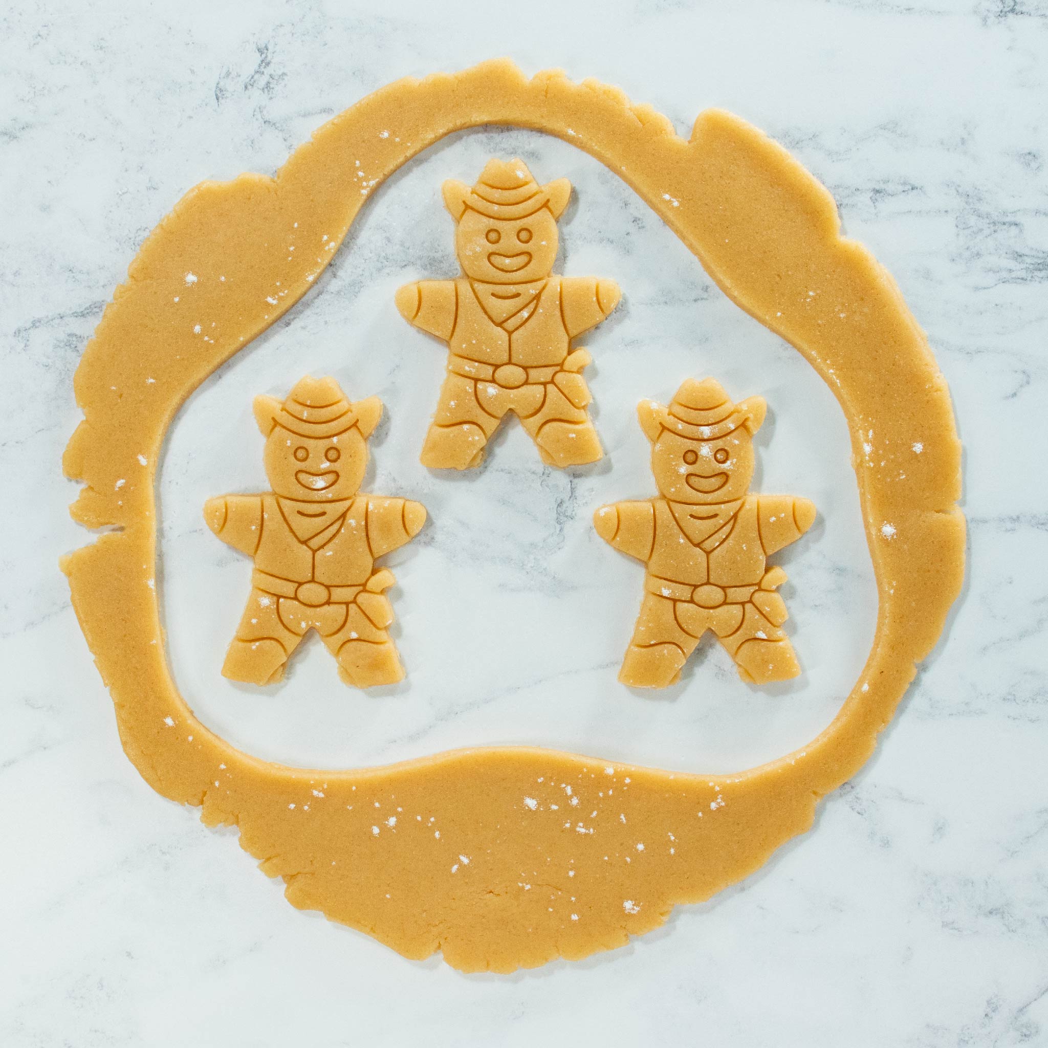 cowboy cookies cutout dough made with bakerlogy gingerbread cowboy cookie cutter