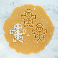 gingerbread scientist cookie cutout dough made with bakerlogy gingerbread scientist cookie cutter