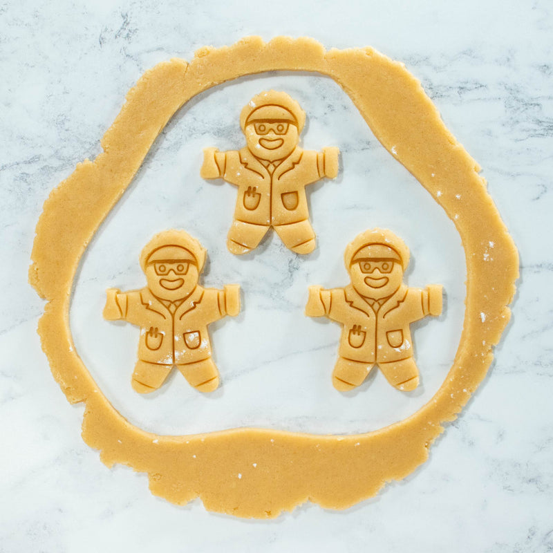 gingerbread scientist cookie cutout dough made with bakerlogy gingerbread scientist cookie cutter