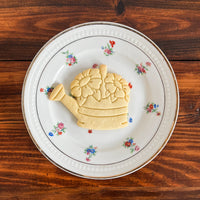 Watering Can with Flowers