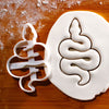 Slithering Snake Cookie Cutter pressed on white fondant icing to show imprints- Bakerlogy