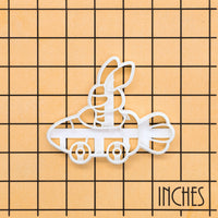 Speedy Bunny with Helmet in Racing Carrot Car