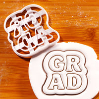 GRAD in Block Letters