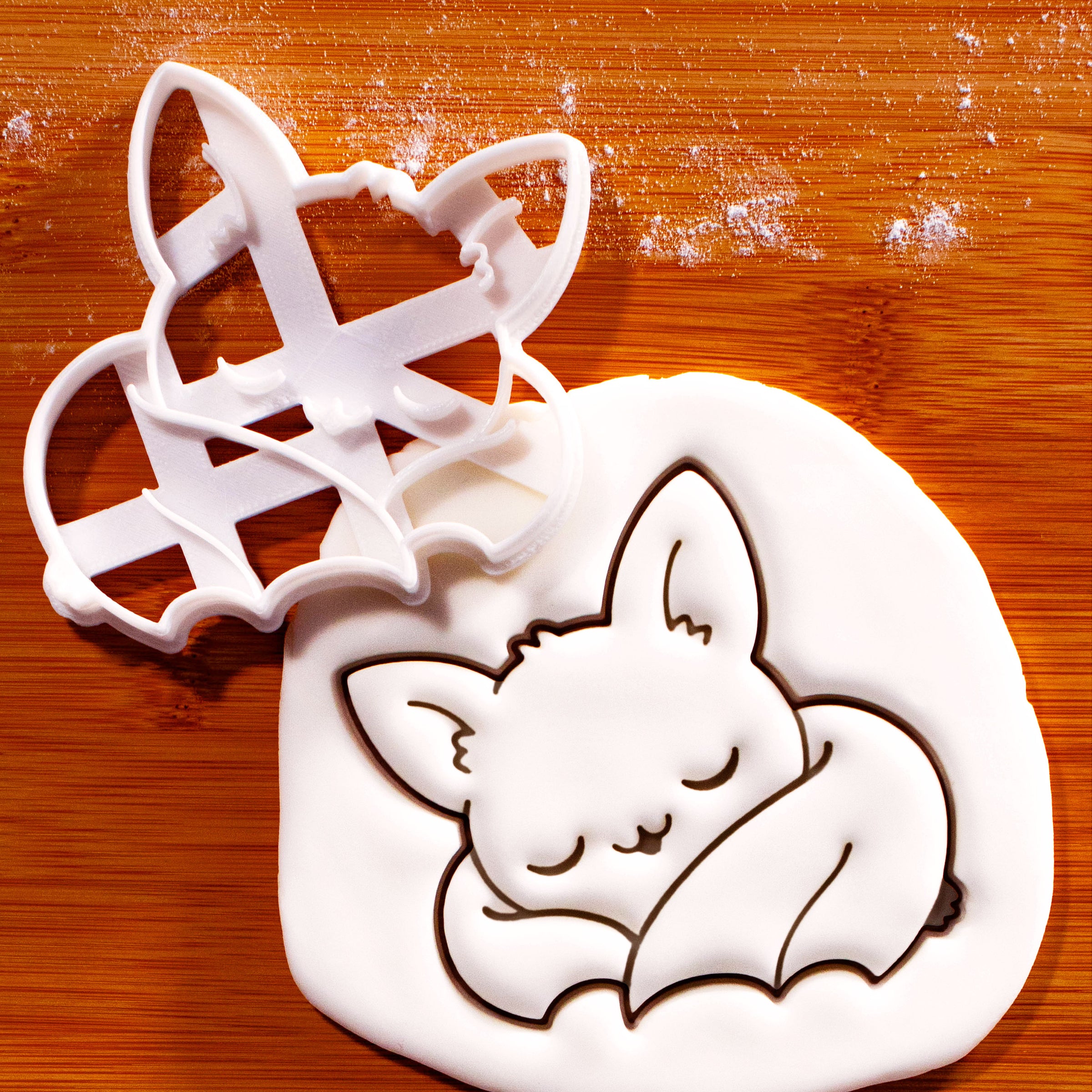 Sleeping Chibi Bat Cookie Cutter with detailed bat impression in fondant for Halloween baking