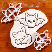 Set of 2 Flying and Sleeping Chibi Bat Cookie Cutters with detailed fondant impressions for Halloween baking