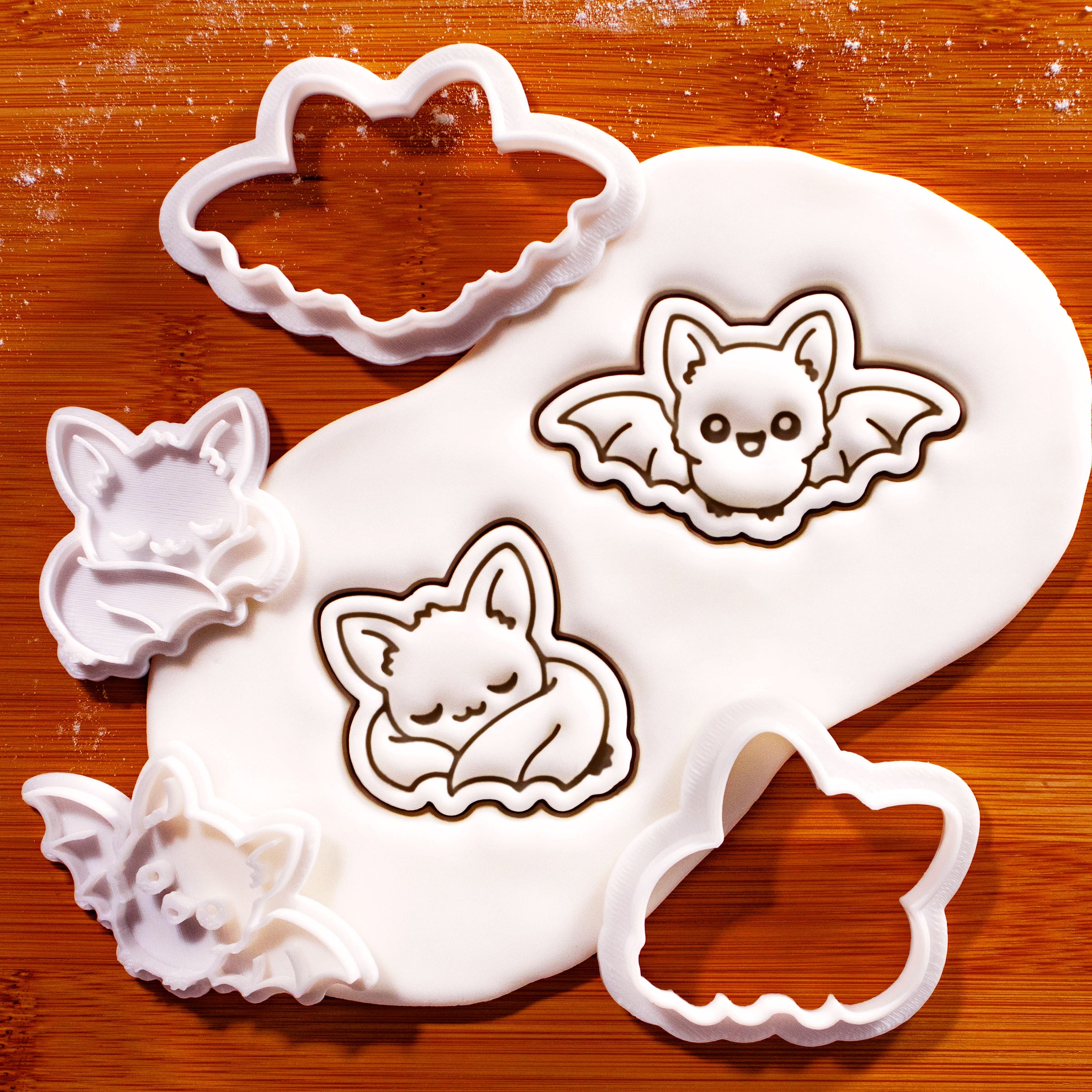Set of Flying and Sleeping Chibi Bat Mini Cookie Cutters and Stamps with detailed fondant impressions for Halloween baking