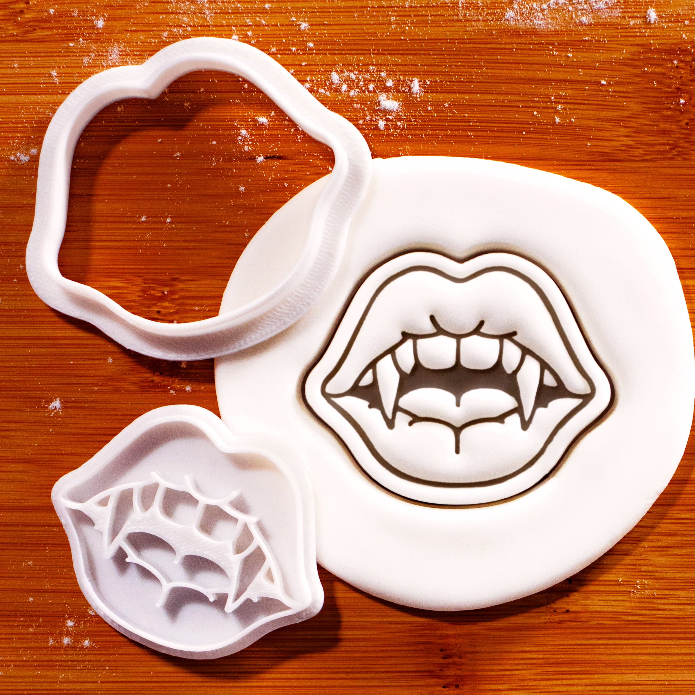 Vampire Fang Kiss Mini Cookie Cutter and Stamp Set with detailed vampire lips and fang impression in fondant