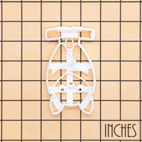 Hanging chibi bat Halloween cookie cutter shown on an inch measurement grid for size reference