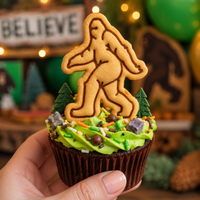 Bigfoot Sasquatch stamped cookie used as a cupcake topper with woodland camping decorations