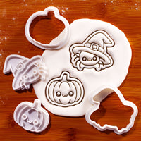 Witchy spider and pumpkin mini cookie cutters and stamps with fondant impressions