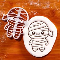 Chibi mummy Halloween cookie cutter with embossed fondant mummy design
