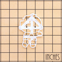 Chibi zombie cookie cutter shown on an inch measurement grid