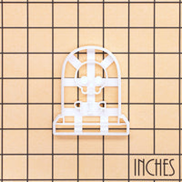 RIP Tombstone with Skull cookie cutter shown on inch measurement grid