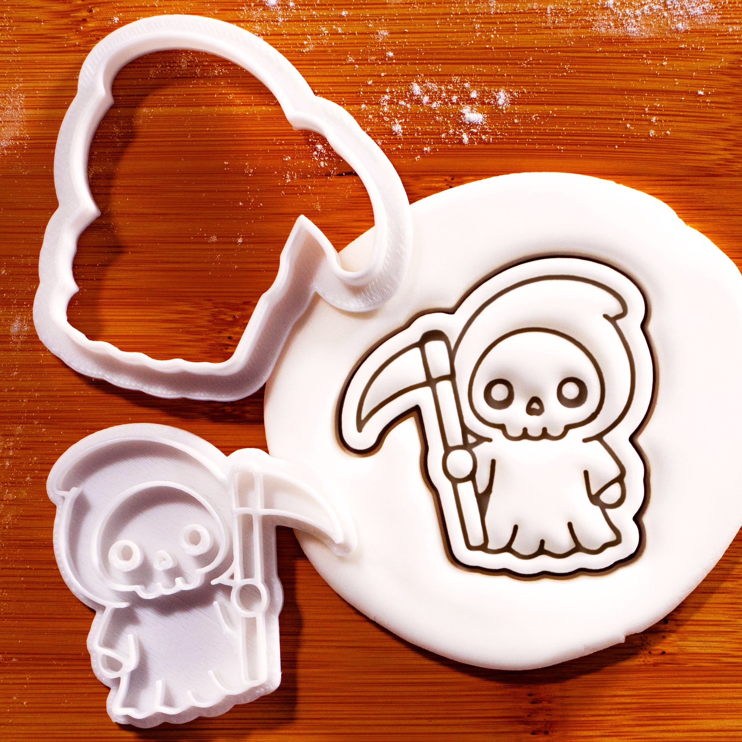 Kawaii Grim Reaper mini cookie cutter and stamp set with hooded skeleton and scythe fondant impression