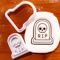 Tombstone with Skull mini cookie cutter and stamp set with fondant impression on a wooden board