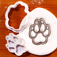 Wolf Paw Print mini cookie cutter and stamp with fondant impression on wooden board