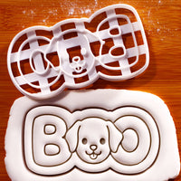 BOO dog face Halloween cookie cutter with puppy design pressed into rolled fondant