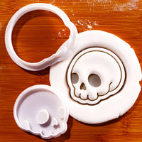 Cute skull side view mini cookie cutter and stamp set with fondant impression on wooden board