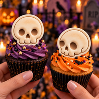Cute skull mini fondant toppers on Halloween cupcakes with front and side view skull designs