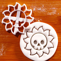 Skull Sun cookie cutter with skull and sunshine ray impression for gothic Halloween baking