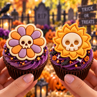 Daisy Skull and Skull Sun fondant cupcake toppers on purple gothic Halloween cupcakes