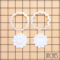 Daisy Skull and Skull Sun Mini cookie cutter and stamp sets on inch grid showing 4-piece set