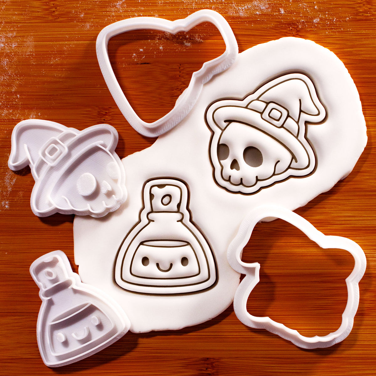 Skull Witch Hat and Smiling Potion Mini cookie cutter and stamp sets with fondant impressions