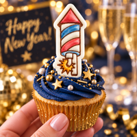 Red white and blue rocket firework fondant topper on New Year cupcake