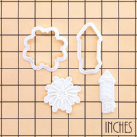 Starburst and Rocket Firework mini cookie cutter and stamp set on inch grid