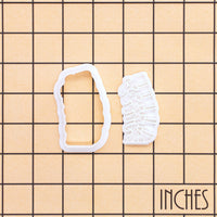 Lumbar spine mini cookie cutter and stamp set on inch grid