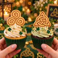 Triskelion and Celtic Triquetra cookie cupcake toppers on green themed cupcakes