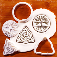 Tree of Life and Triquetra mini cookie cutter and stamp set with fondant impressions on wooden background