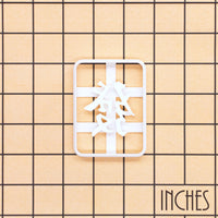 Green Dragon mahjong cookie cutter shown on inch measurement grid