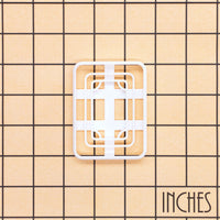 White Dragon mahjong cookie cutter and stamp shown on inch measurement grid