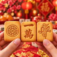 Three large mahjong cookies with embossed 1 Circle 1 Character and 1 Bamboo tile designs