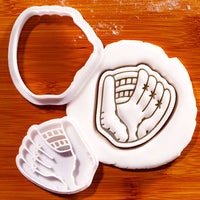 Softball glove mini cookie cutter and stamp shown with stamped fondant