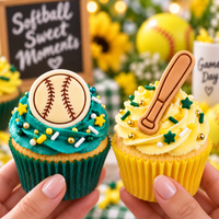Softball and bat mini fondant toppers on decorated cupcakes for a softball party