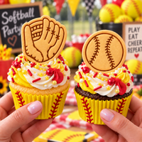 Softball and glove mini stamped cookies on decorated cupcakes for a softball party