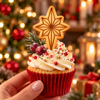 Star of Bethlehem Christmas cookie cupcake topper made with mini cookie cutter and detailed eight-point star stamp