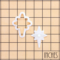 Star of Bethlehem mini cookie cutter and stamp set shown on inch grid for Christmas baking size reference