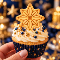 Eight-point star cookie cupcake topper made with mini geometric star cookie cutter and stamp
