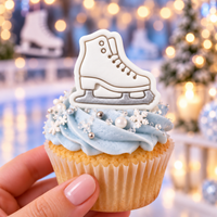 Ice skate fondant cupcake topper made with mini ice skate cookie cutter and stamp for winter baking