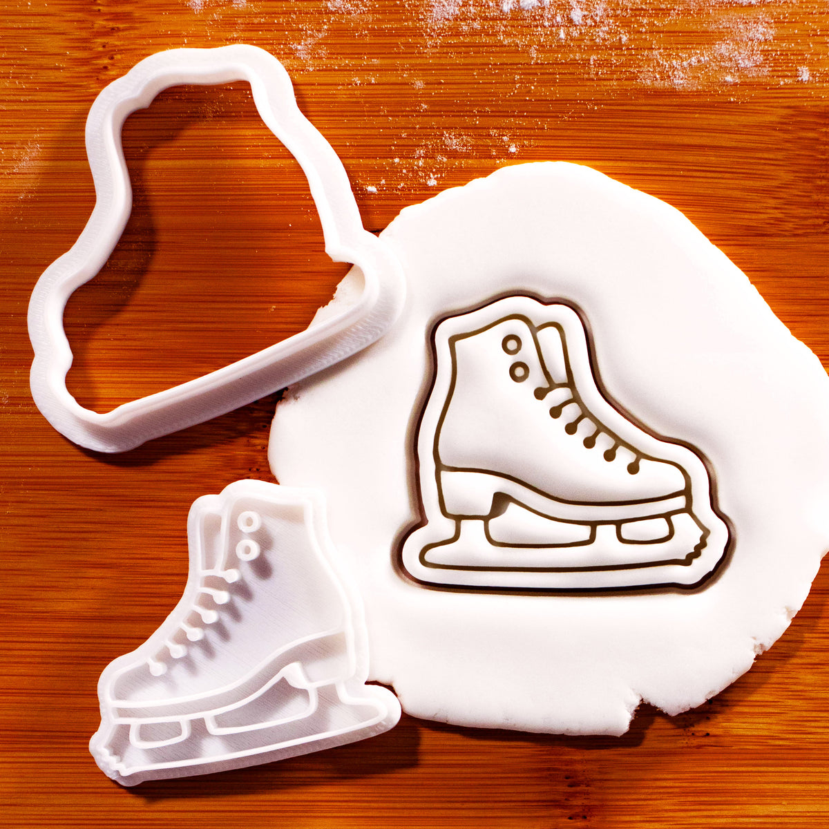 Ice skate mini cookie cutter and stamp set with lace-up skating boot impression in fondant