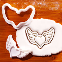 Heart with wings mini cookie cutter and stamp with detailed winged heart fondant impression