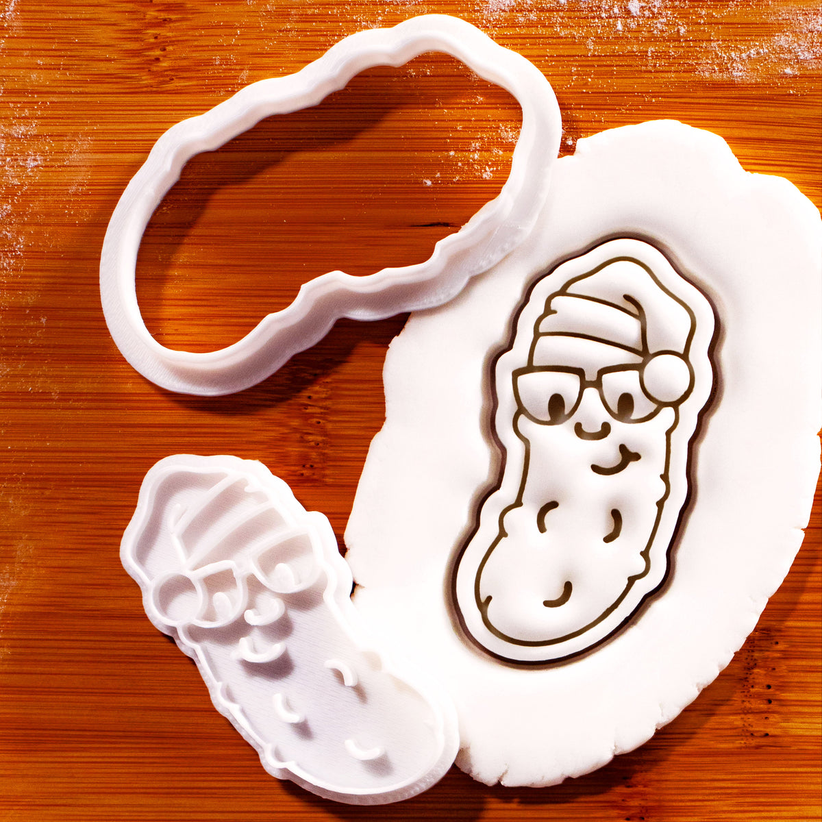 Christmas pickle mini cookie cutter and stamp with Santa hat and glasses fondant impression