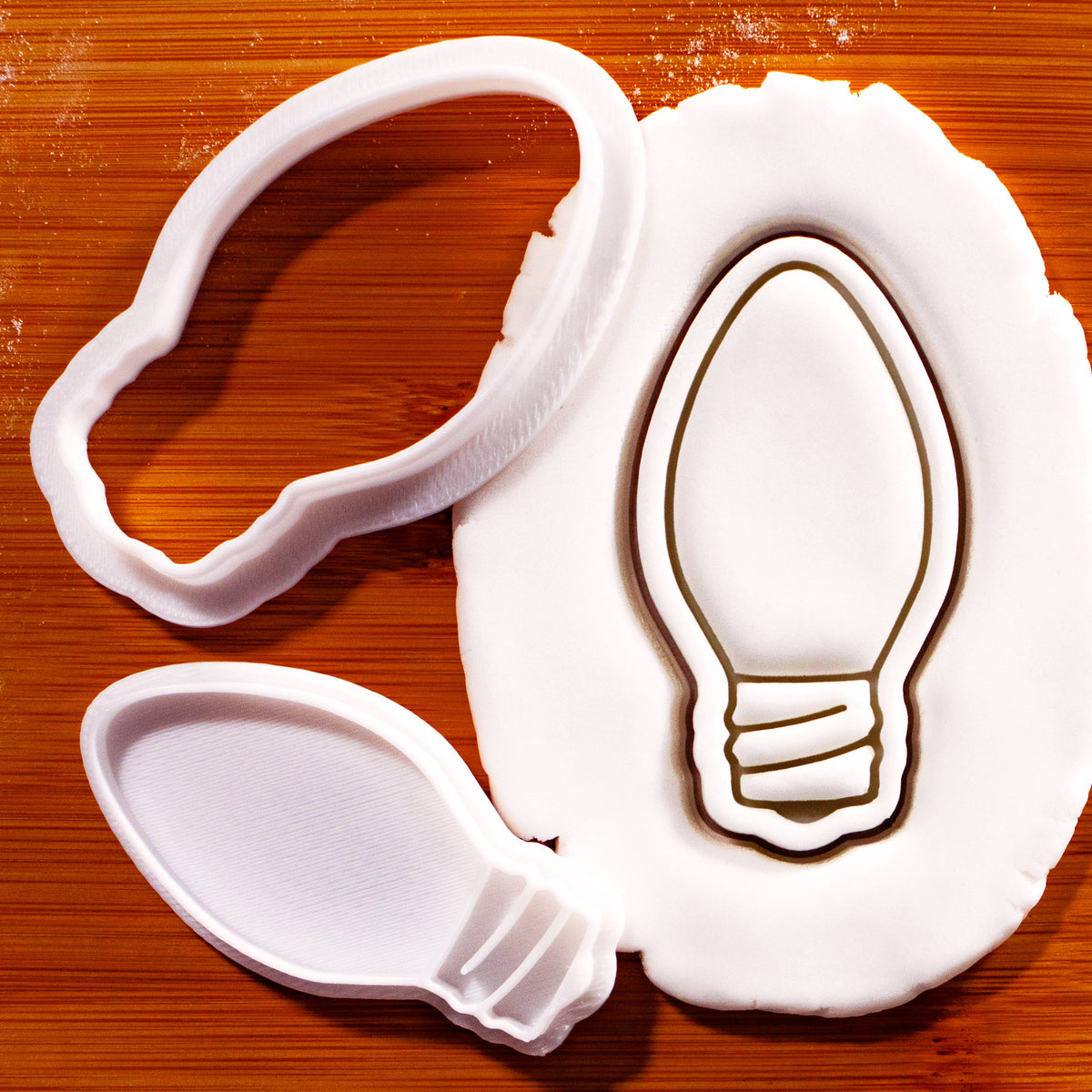 Christmas light bulb mini cookie cutter and stamp with detailed fondant impression for Xmas baking