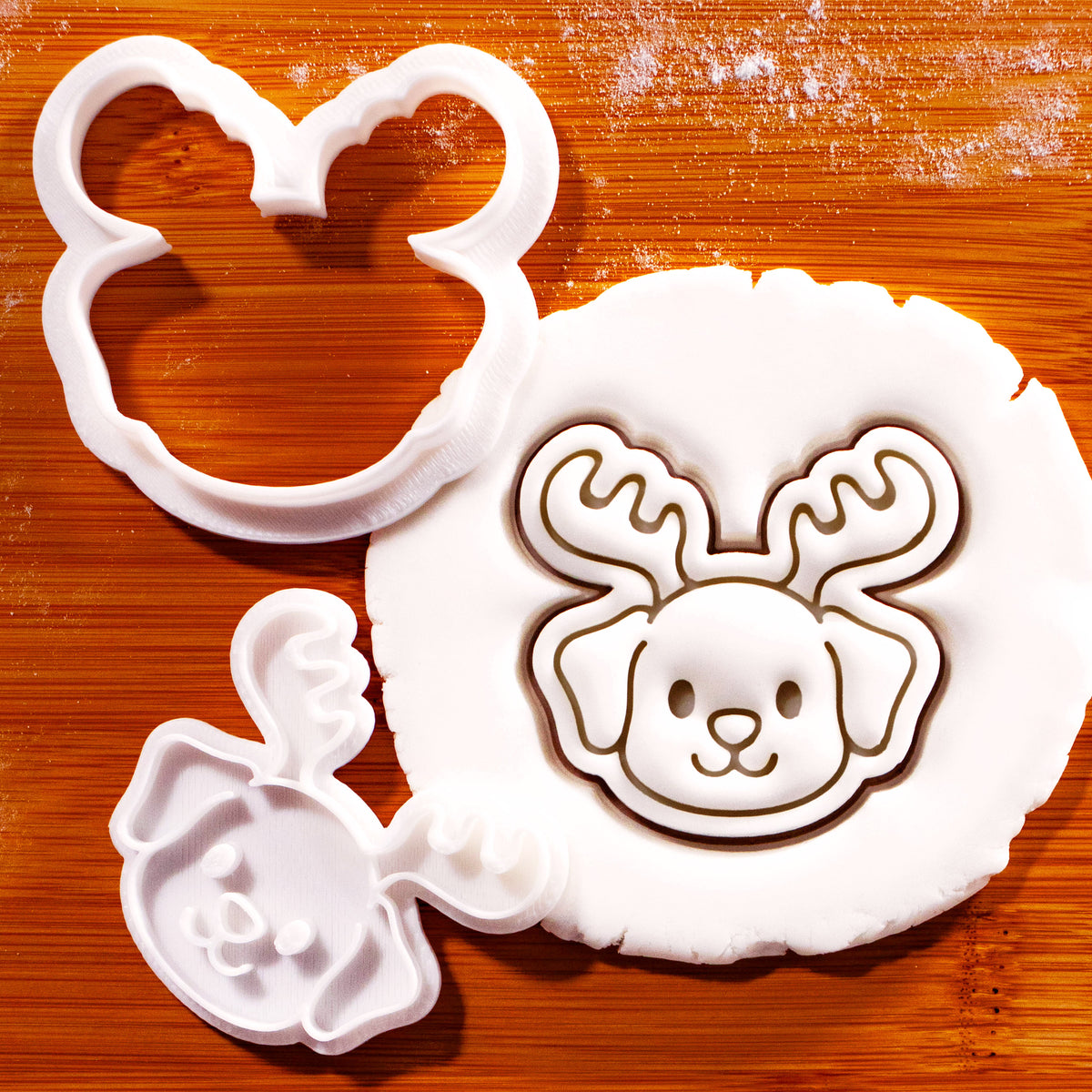 Puppy reindeer mini cookie cutter and stamp with detailed fondant impression for Christmas baking