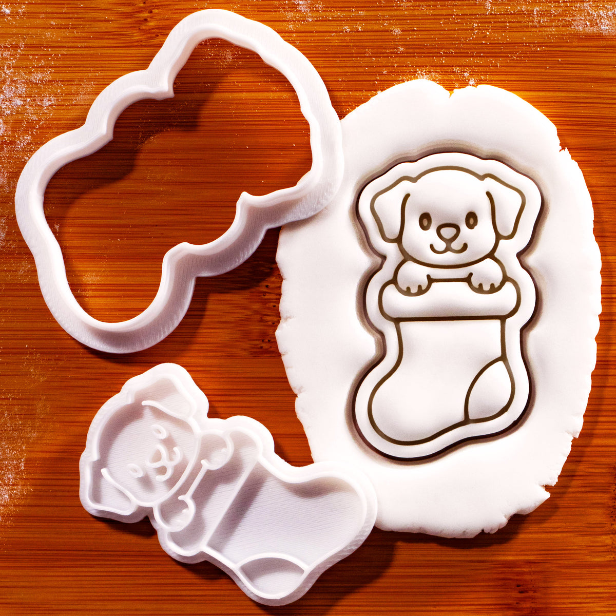 Puppy in Christmas stocking mini cookie cutter and stamp with detailed fondant impression for festive baking