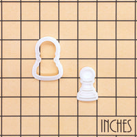 Pawn chess mini cookie cutter and stamp shown on inch grid for size reference