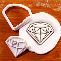 Diamond mini cookie cutter and detail stamp pressed into white fondant
